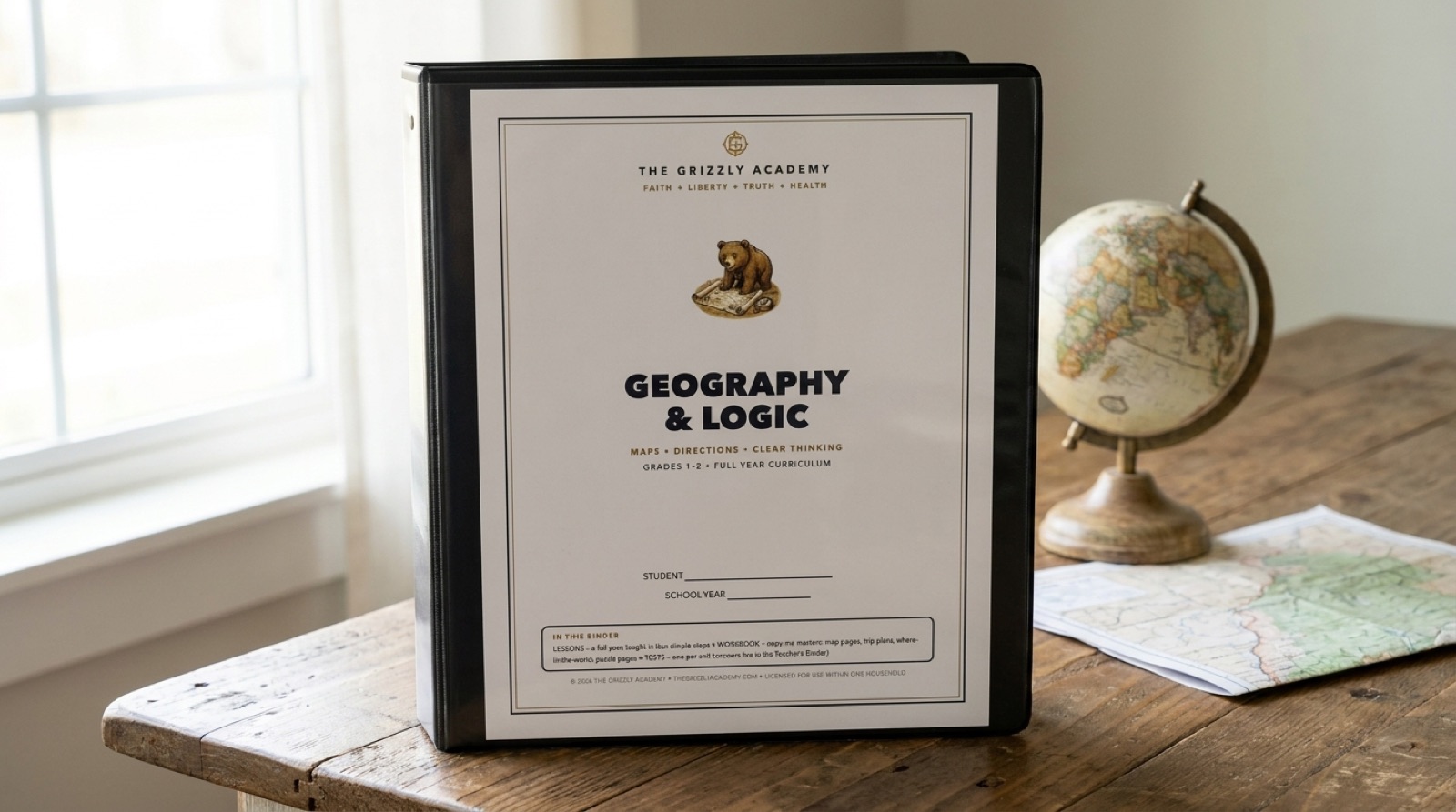 Geography and Logic homeschool binder with bear cub cover